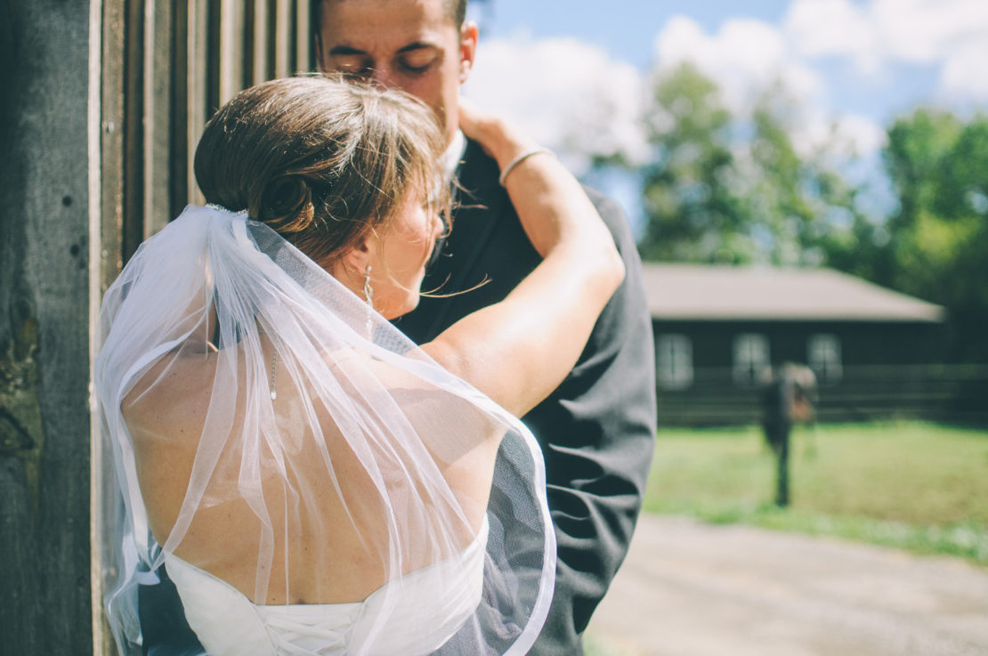 Canva - Bride and Groom Hugging