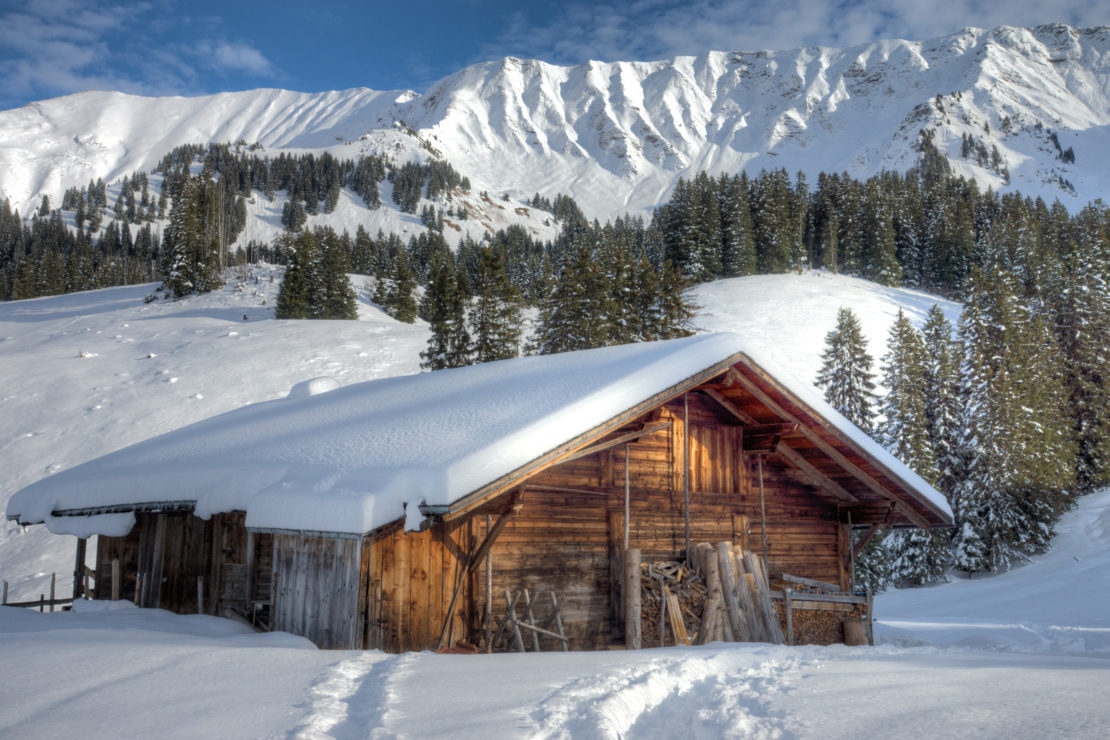 Canva - Cabin In The Mountains In Winter