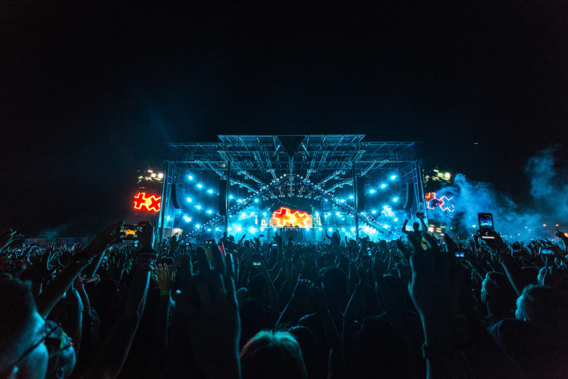 Canva - Crowd in Front of Blue and Orange Stage during a Concert at Night